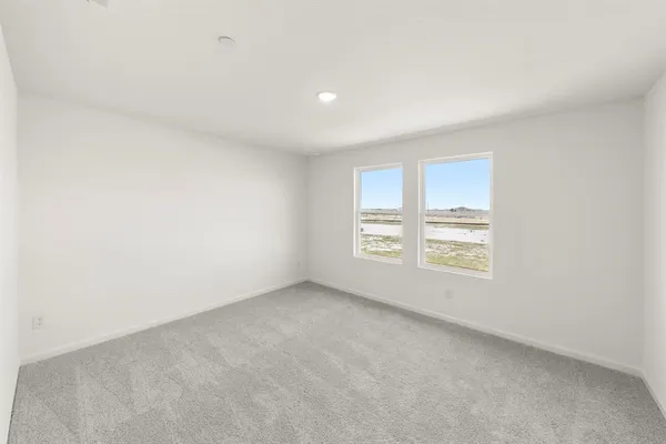 an empty room with a natural light