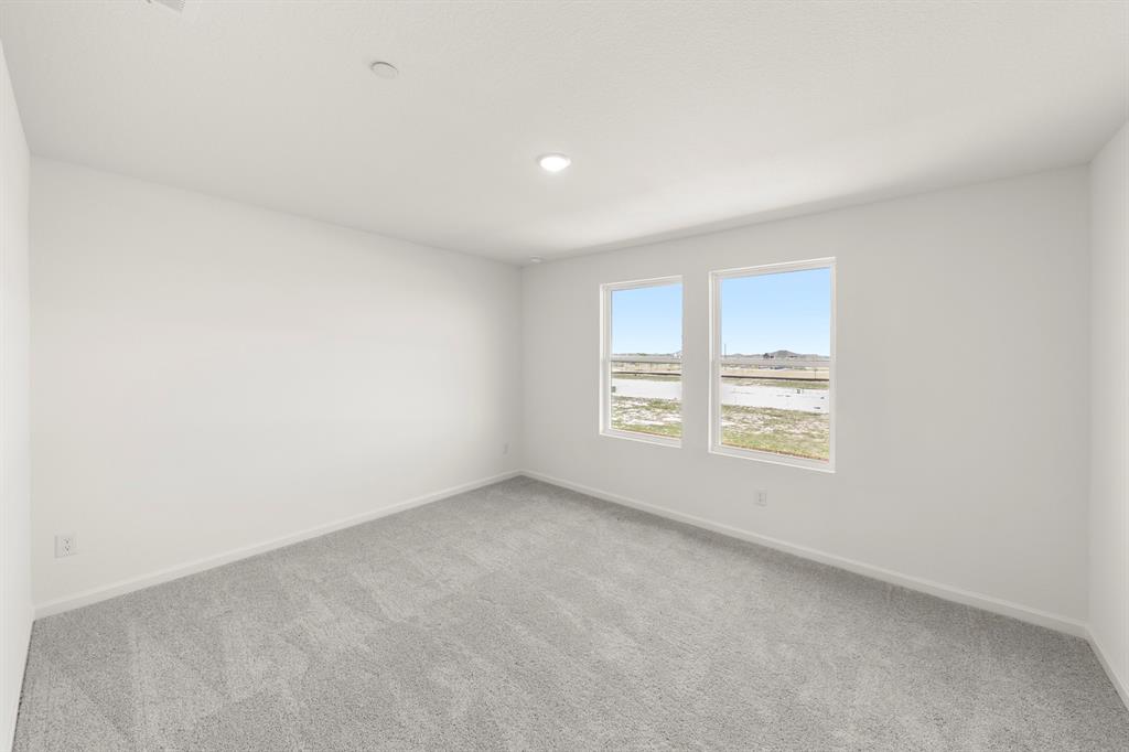 1444 Lake Alpine Trail Anna, TX 75409 - Photo 16 of 29 an empty room with a window