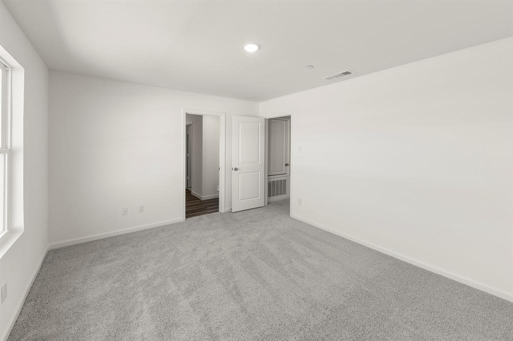 1444 Lake Alpine Trail Anna, TX 75409 - Photo 17 of 29 an empty room with a natural light