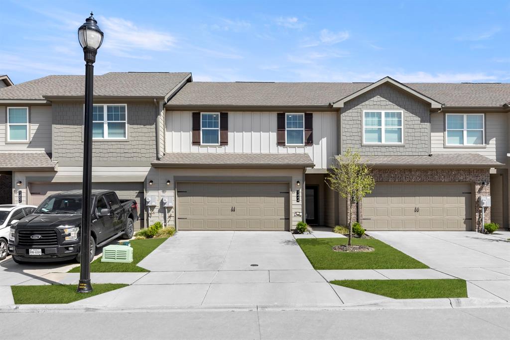 1444 Lake Alpine Trail Anna, TX 75409 - Photo 2 of 29 a front view of a house with a garden and parking