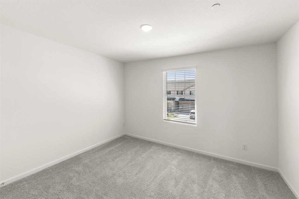 1444 Lake Alpine Trail Anna, TX 75409 - Photo 23 of 29 an empty room with a window