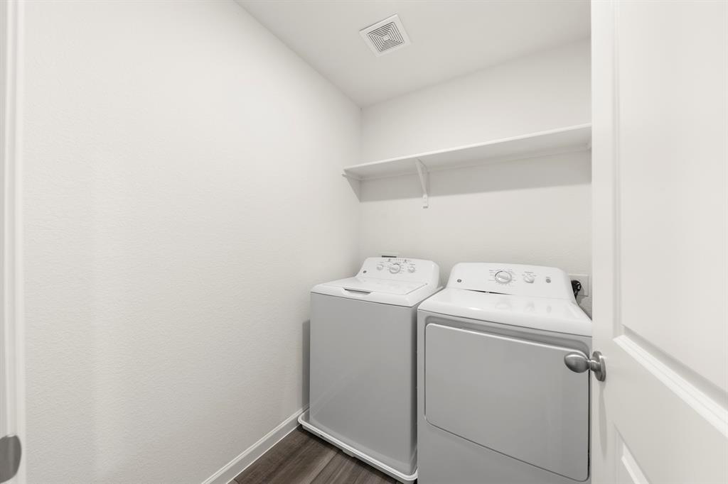 1444 Lake Alpine Trail Anna, TX 75409 - Photo 26 of 29 a utility room with dryer and washer