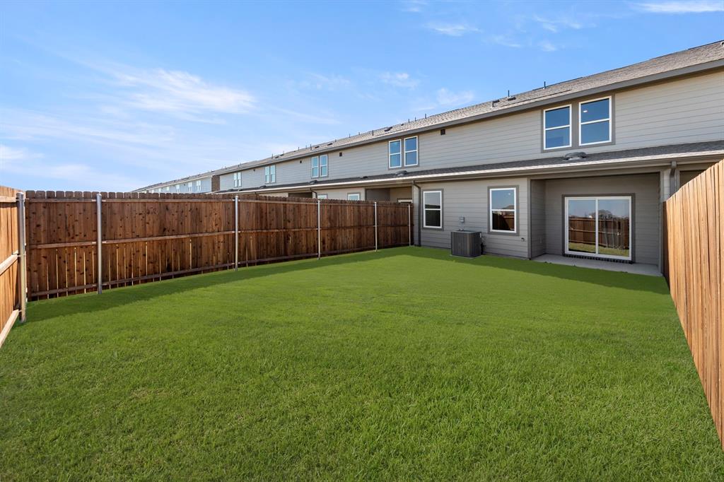 1444 Lake Alpine Trail Anna, TX 75409 - Photo 29 of 29 a view of a house with a yard and wooden fence