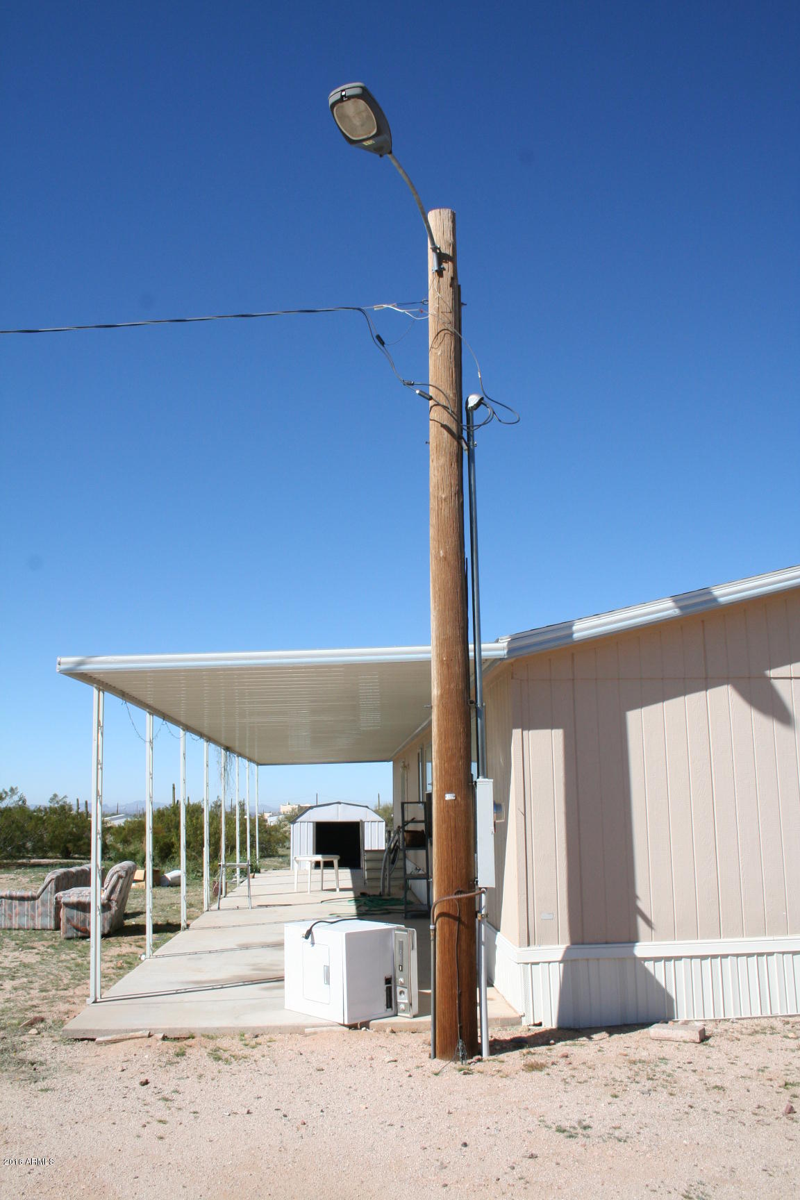 12620 North Hexcel Road Florence, AZ 85132 - Photo 6 of 48 electric pole with streetlight