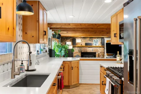 $938,000 | 11933 South Maxwell Hill Road, Littleton, CO 80127