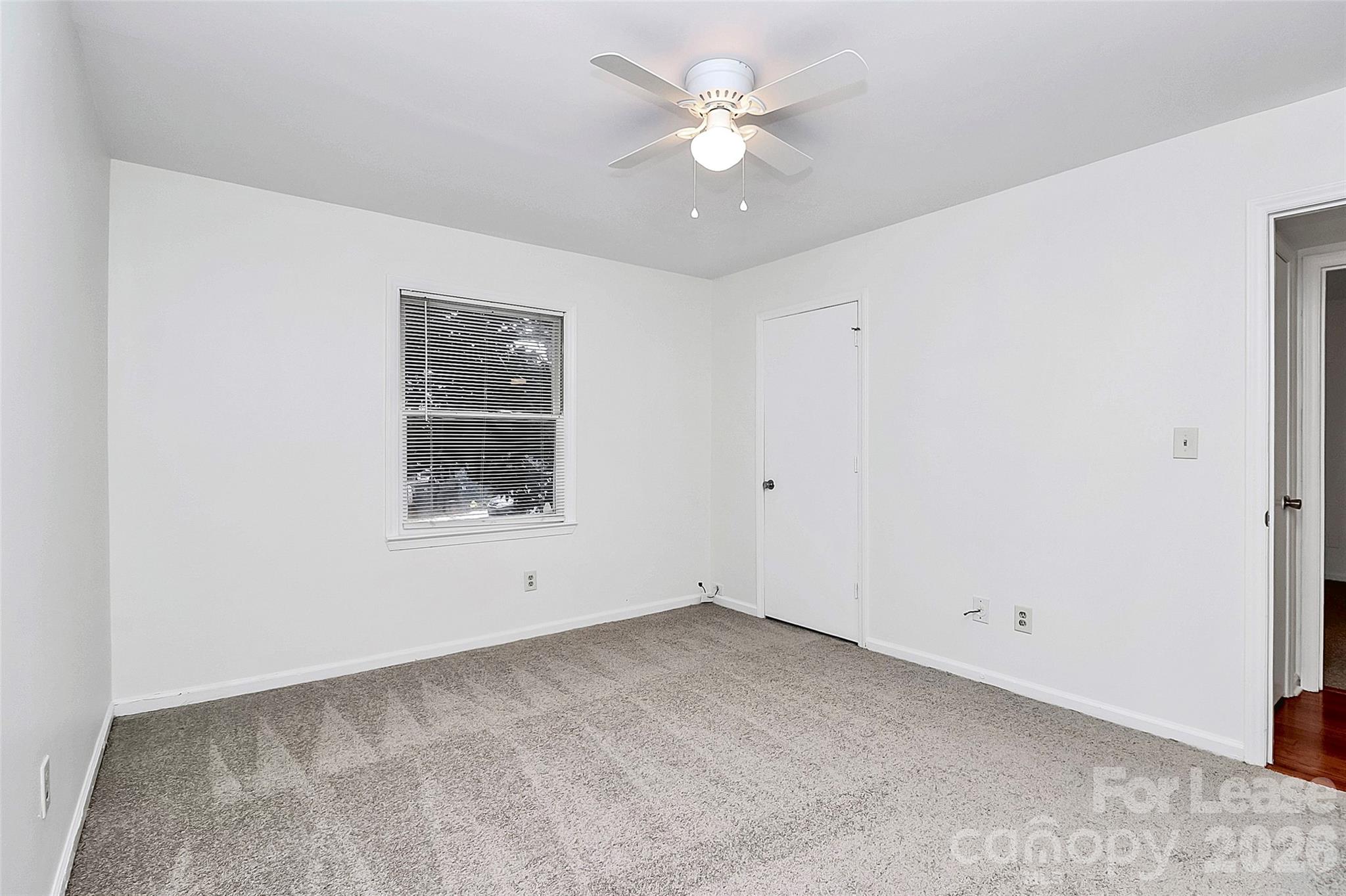 430 Queens Road, Unit 711 Charlotte, NC 28204 - Photo 17 of 20 a view of an empty room with a window