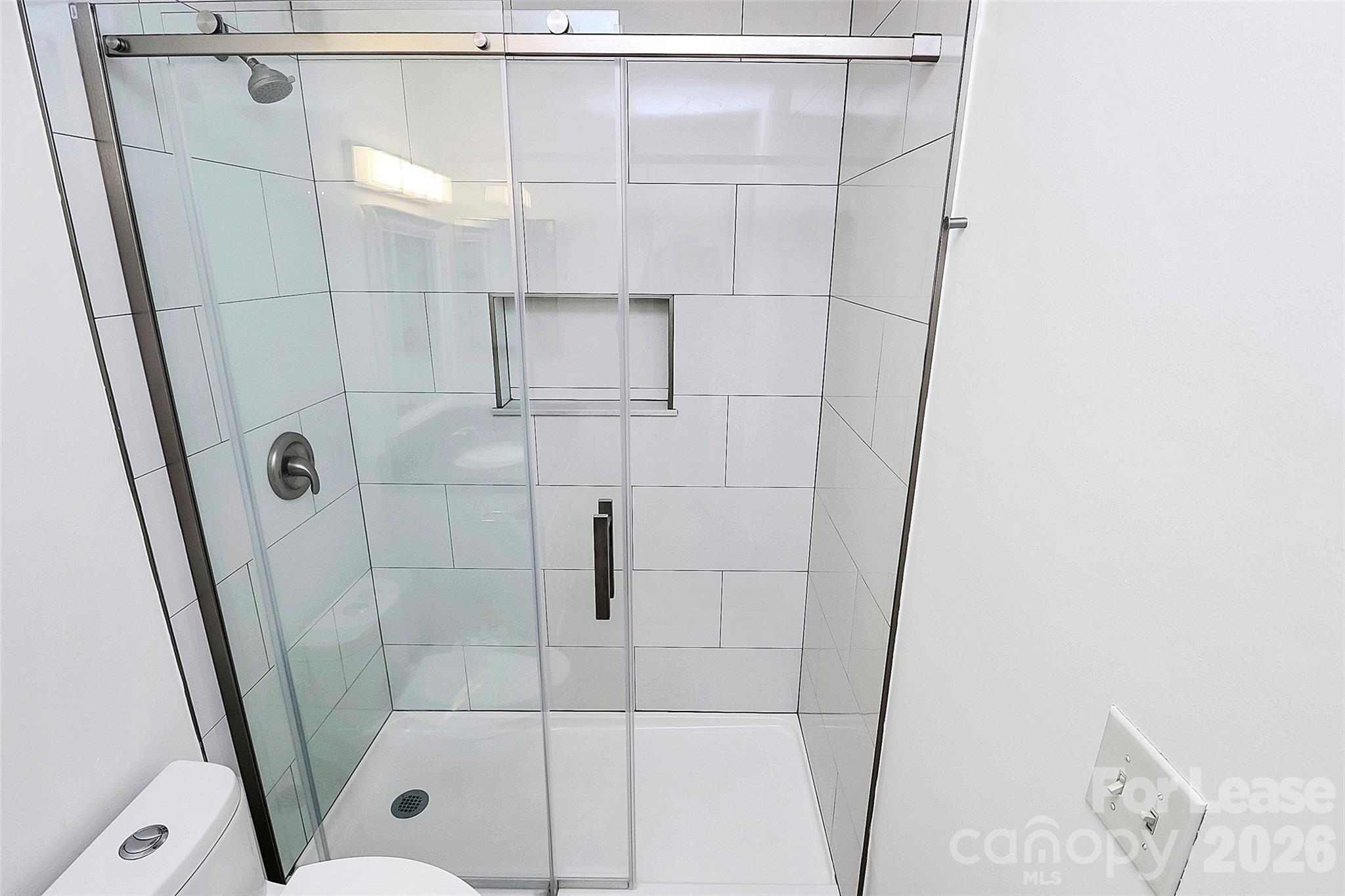 430 Queens Road, Unit 711 Charlotte, NC 28204 - Photo 20 of 20 a bathroom with a shower