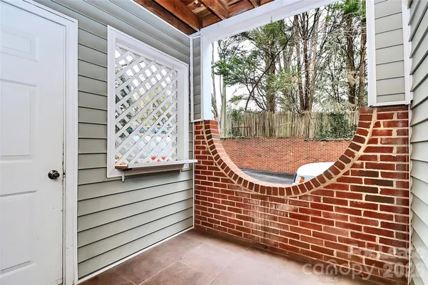 a view of a wooden door with a window