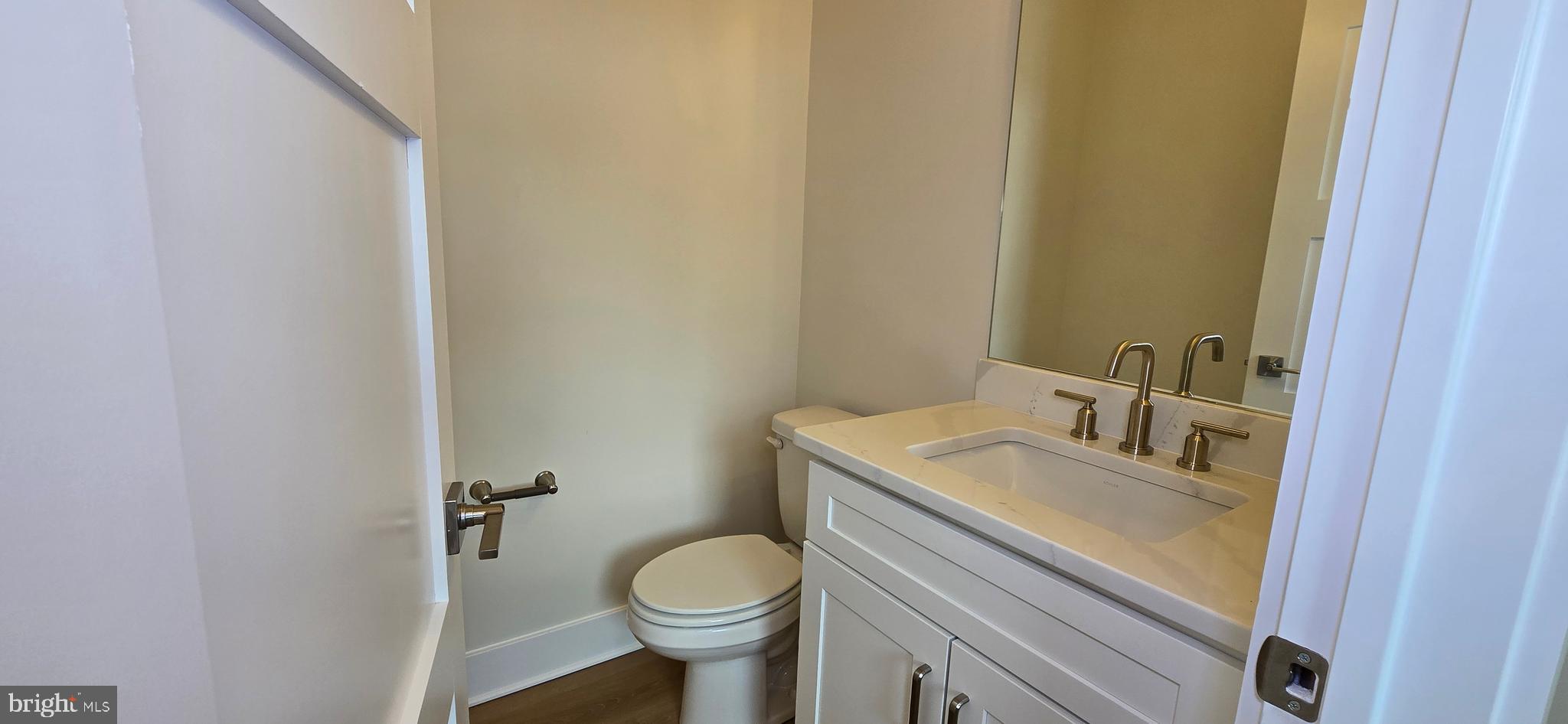 414 Chapel Alley, Unit 2 Frederick, MD 21701 - Photo 12 of 41 a bathroom with a sink and a toilet