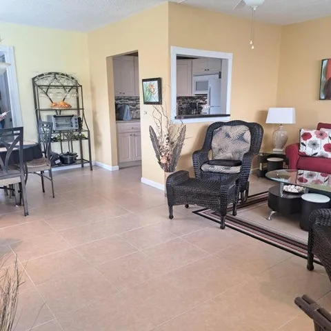 a living room with furniture and a couch