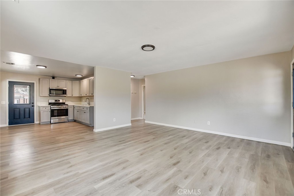 582 Wesley Street Banning, CA 92220 - Photo 14 of 49 a view of kitchen with wooden floor