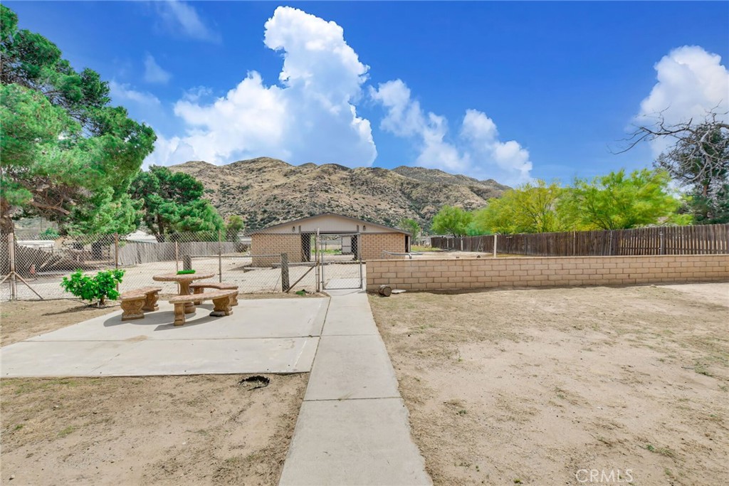 582 Wesley Street Banning, CA 92220 - Photo 27 of 49 a view of a backyard