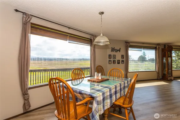a kitchen with a sink cabinets and a window