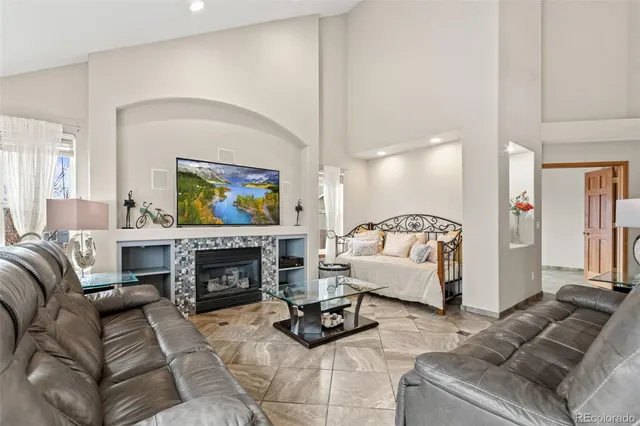 a spacious bathroom with a sink a toilet and shower