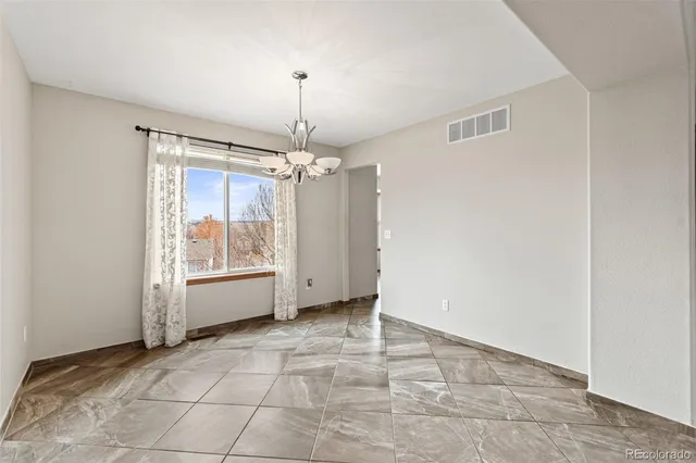 a bathroom with a sink toilet and mirror
