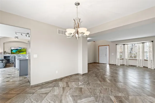 a view of entryway with stairs