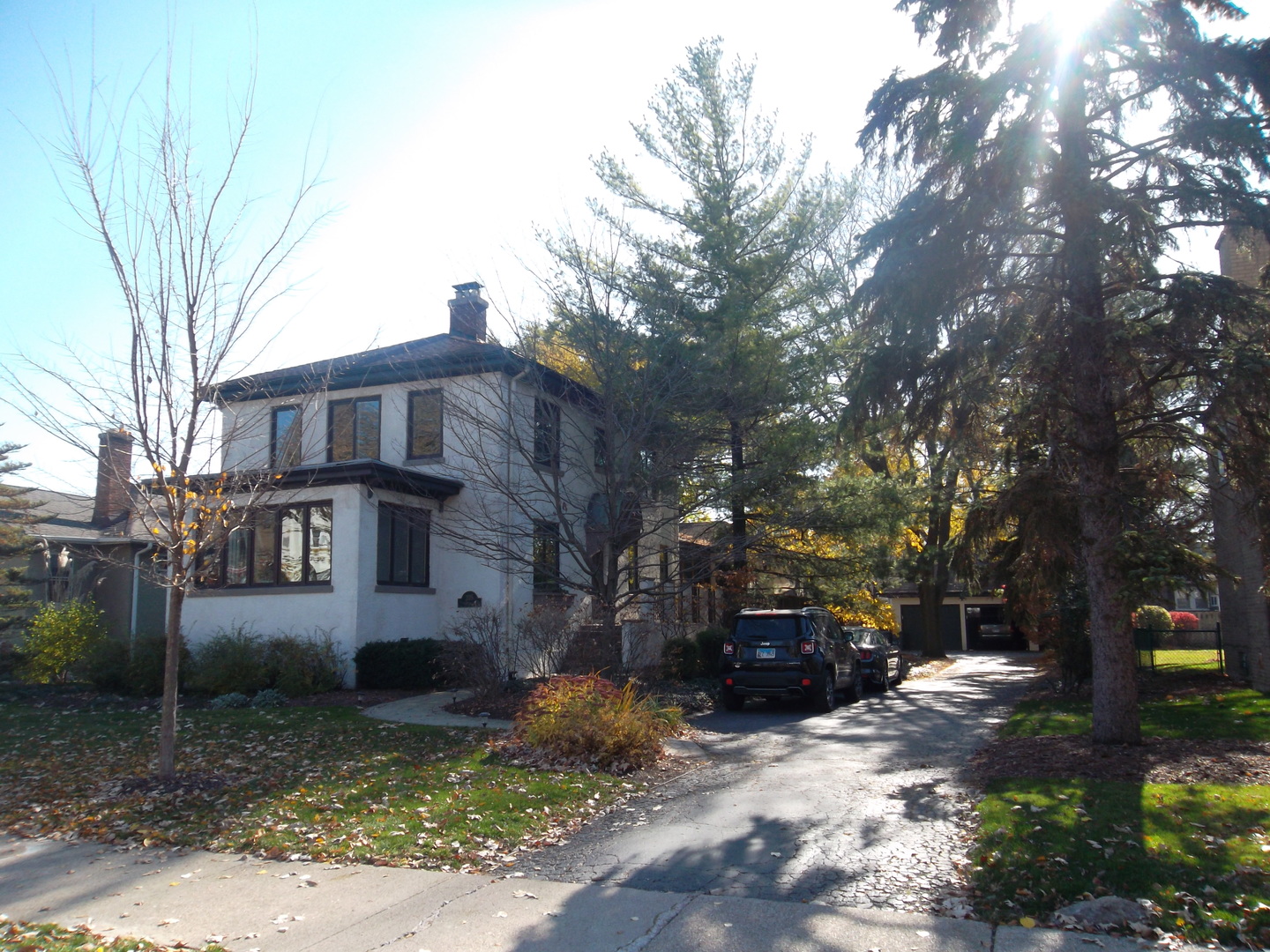 205 Herrick Road Riverside, IL 60546 - Photo 1 of 28 a front view of a house with a yard