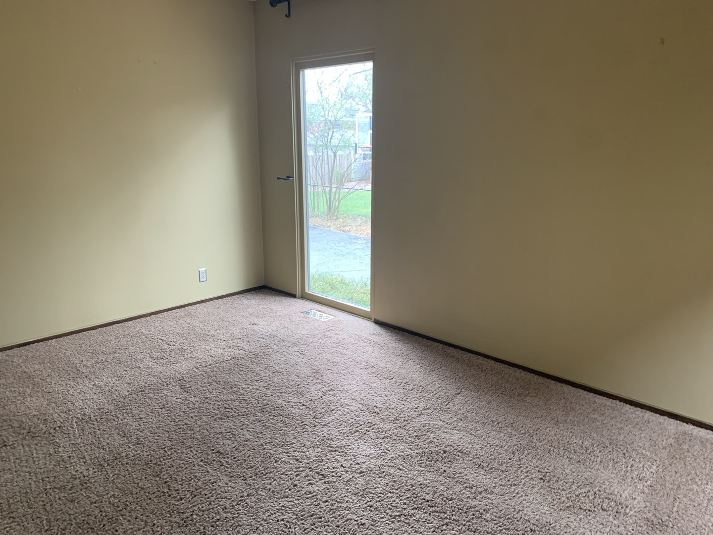 205 Herrick Road Riverside, IL 60546 - Photo 14 of 28 a view of an empty room with a window