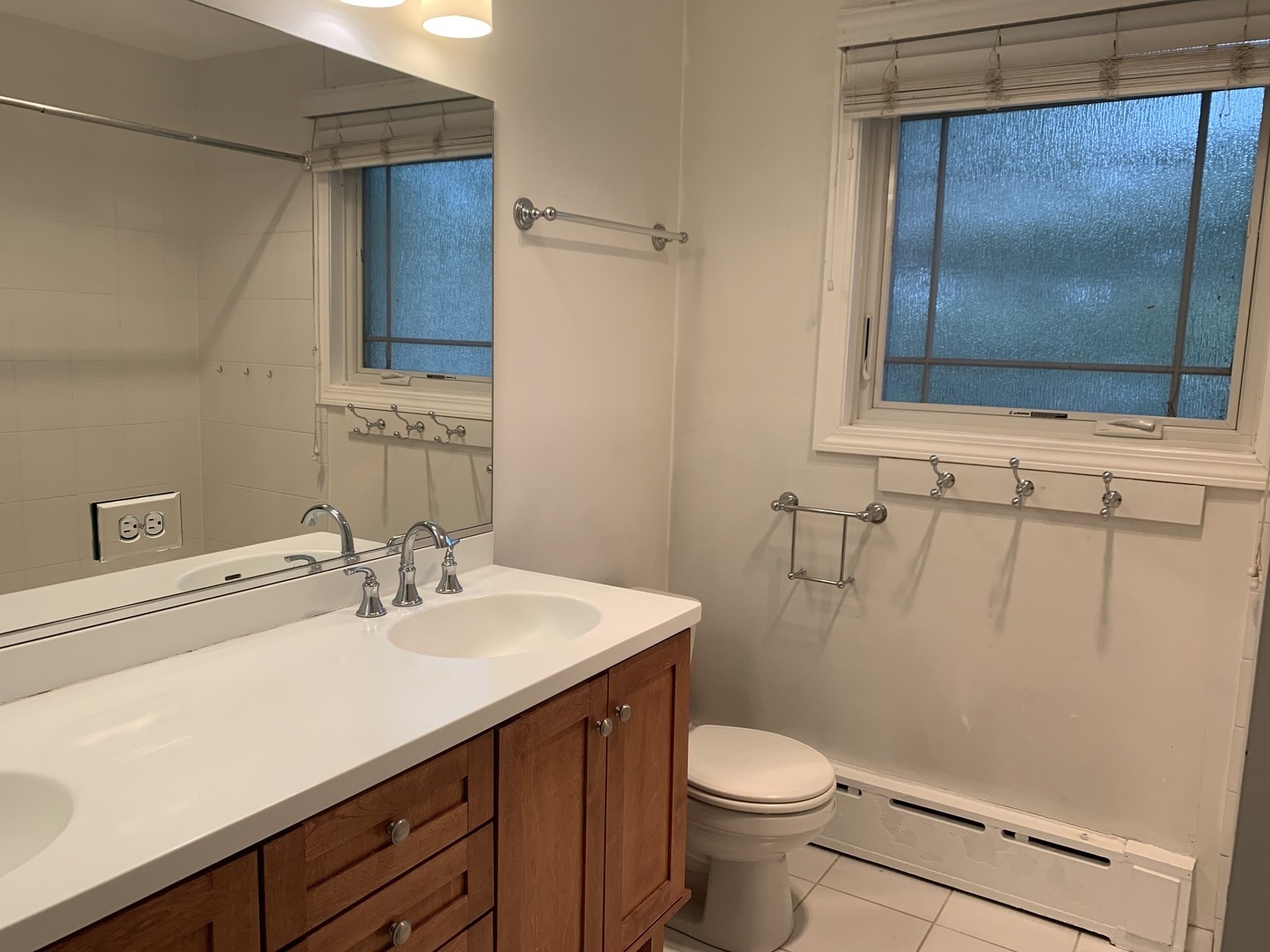 205 Herrick Road Riverside, IL 60546 - Photo 19 of 28 a bathroom with a sink a toilet and shower