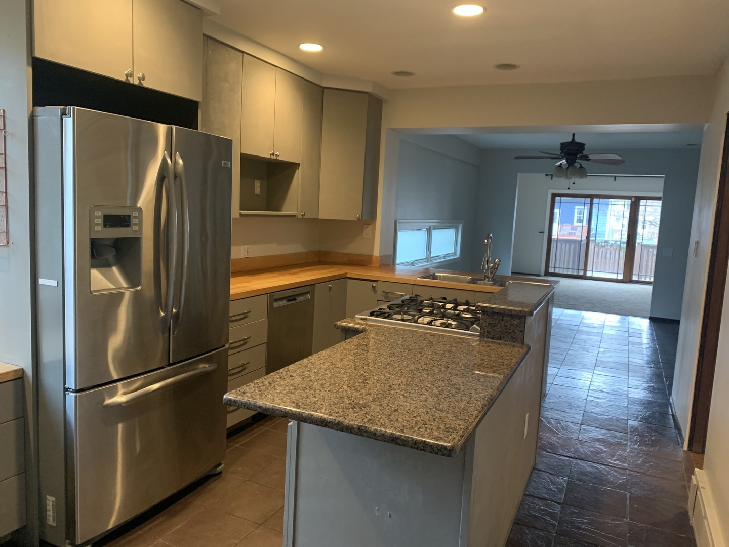 205 Herrick Road Riverside, IL 60546 - Photo 6 of 28 a kitchen with stainless steel appliances granite countertop a refrigerator a stove and a sink