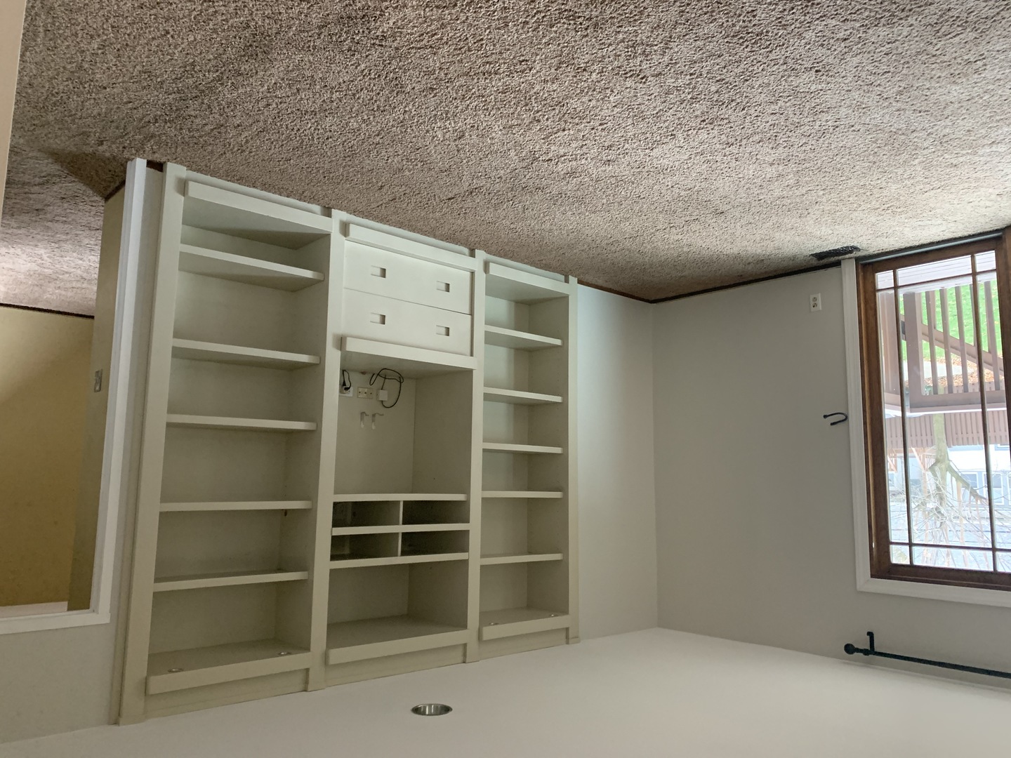 205 Herrick Road Riverside, IL 60546 - Photo 10 of 28 a view of an empty room with a window