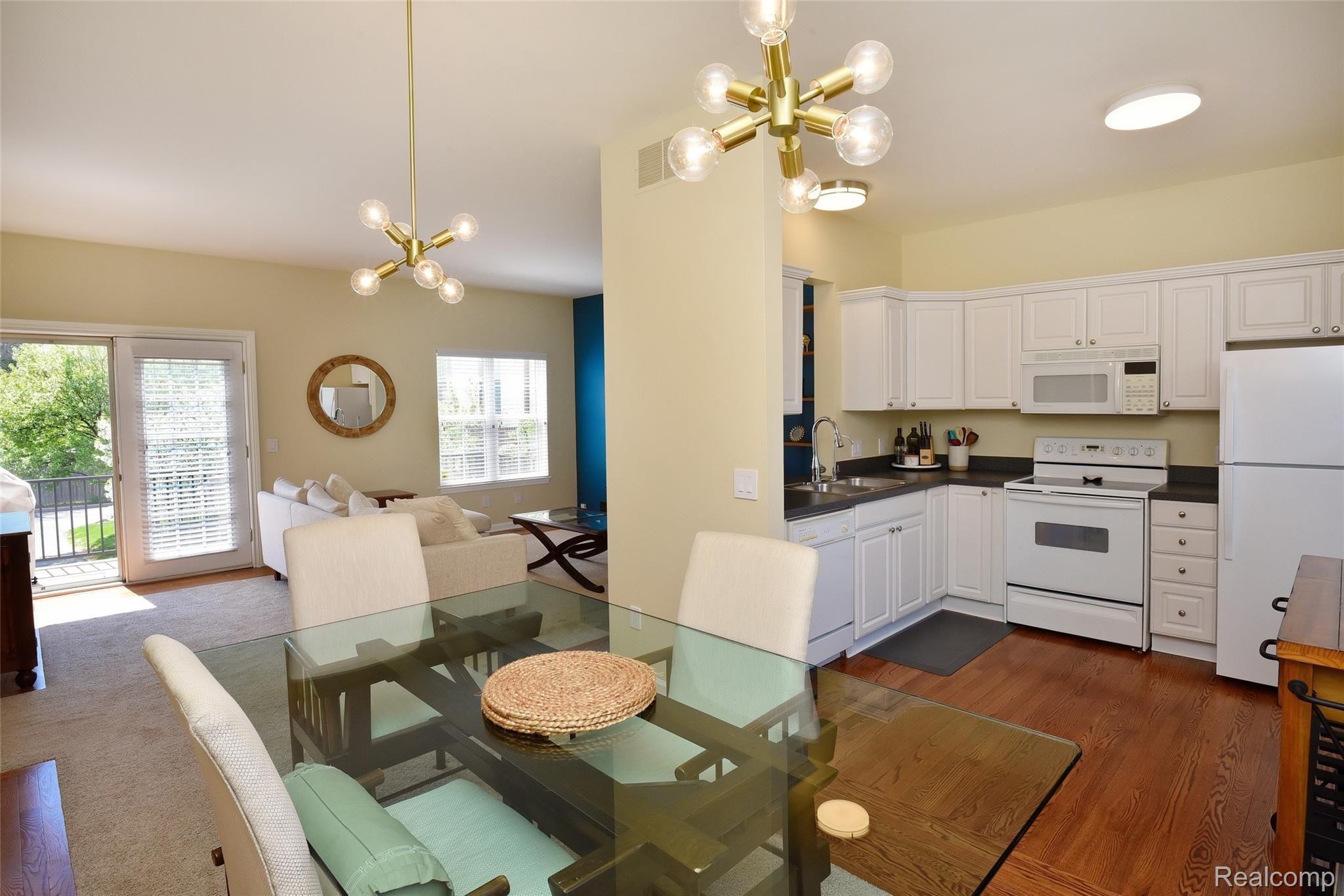 2672 Crooks Road, Unit 4 Royal Oak, MI 48073 - Photo 11 of 25 View into living room and kitchen