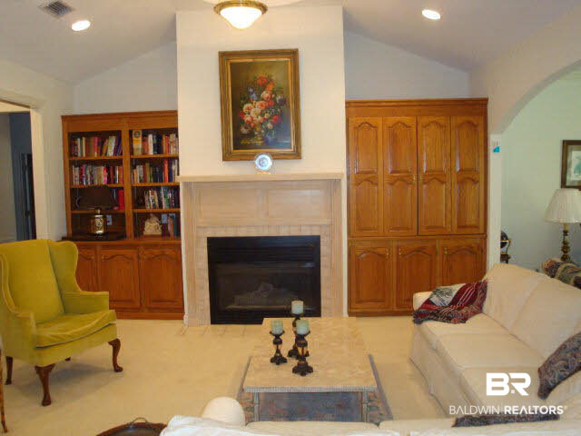108 Lakeridge Drive Fairhope, AL 36532 - Photo 8 of 17 BEAUTIFUL BUILT IN BOOKSHELVES AND CABINETS. GAS FIREPLACE