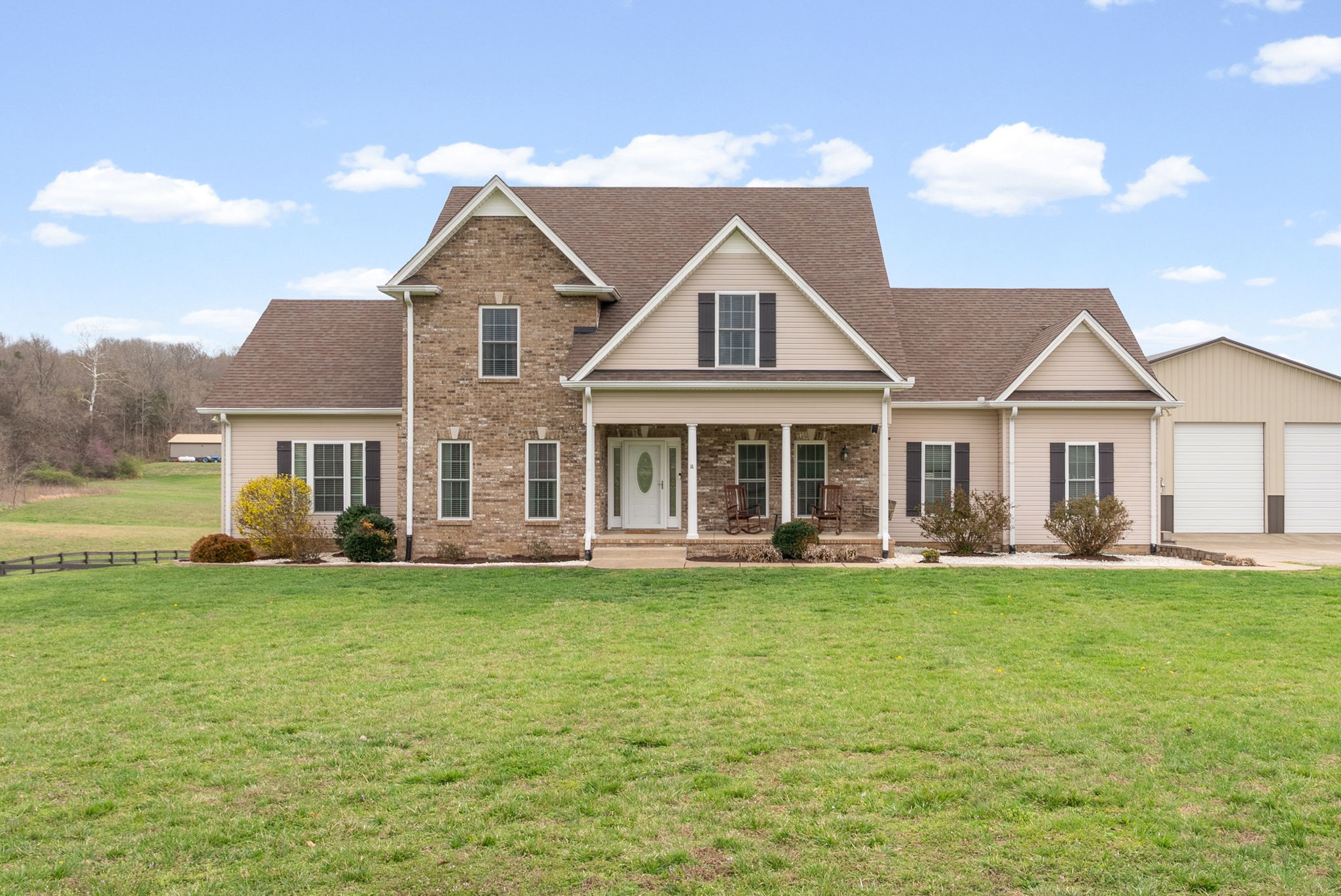 3021 7 Mile Ferry Road Clarksville, TN 37040 - Photo 1 of 99 a front view of a house with a garden