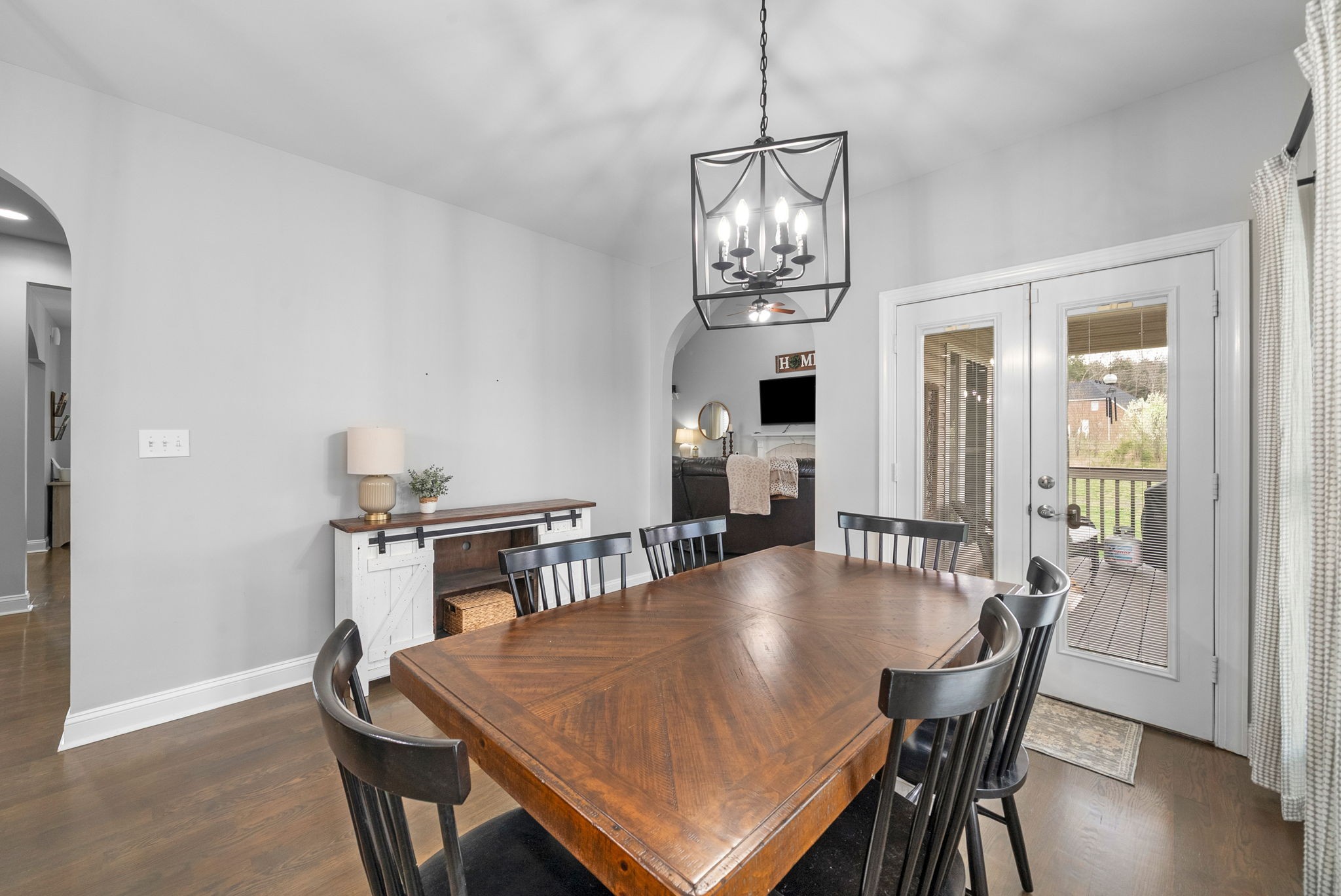 3021 7 Mile Ferry Road Clarksville, TN 37040 - Photo 19 of 99 a view of a dining room with furniture window and wooden floor