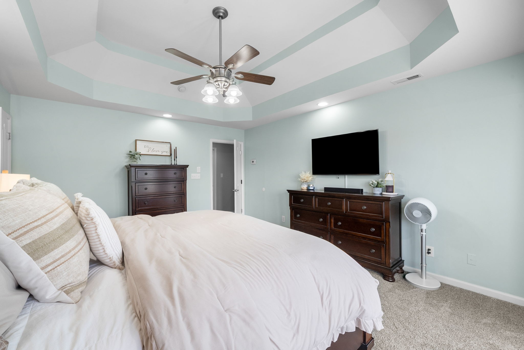 3021 7 Mile Ferry Road Clarksville, TN 37040 - Photo 35 of 99 a bedroom with a bed and a flat screen tv
