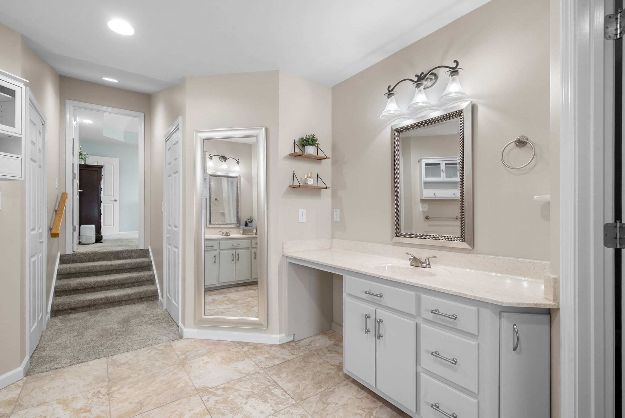 3021 7 Mile Ferry Road Clarksville, TN 37040 - Photo 44 of 99 a spacious bathroom with a double vanity sink and mirror