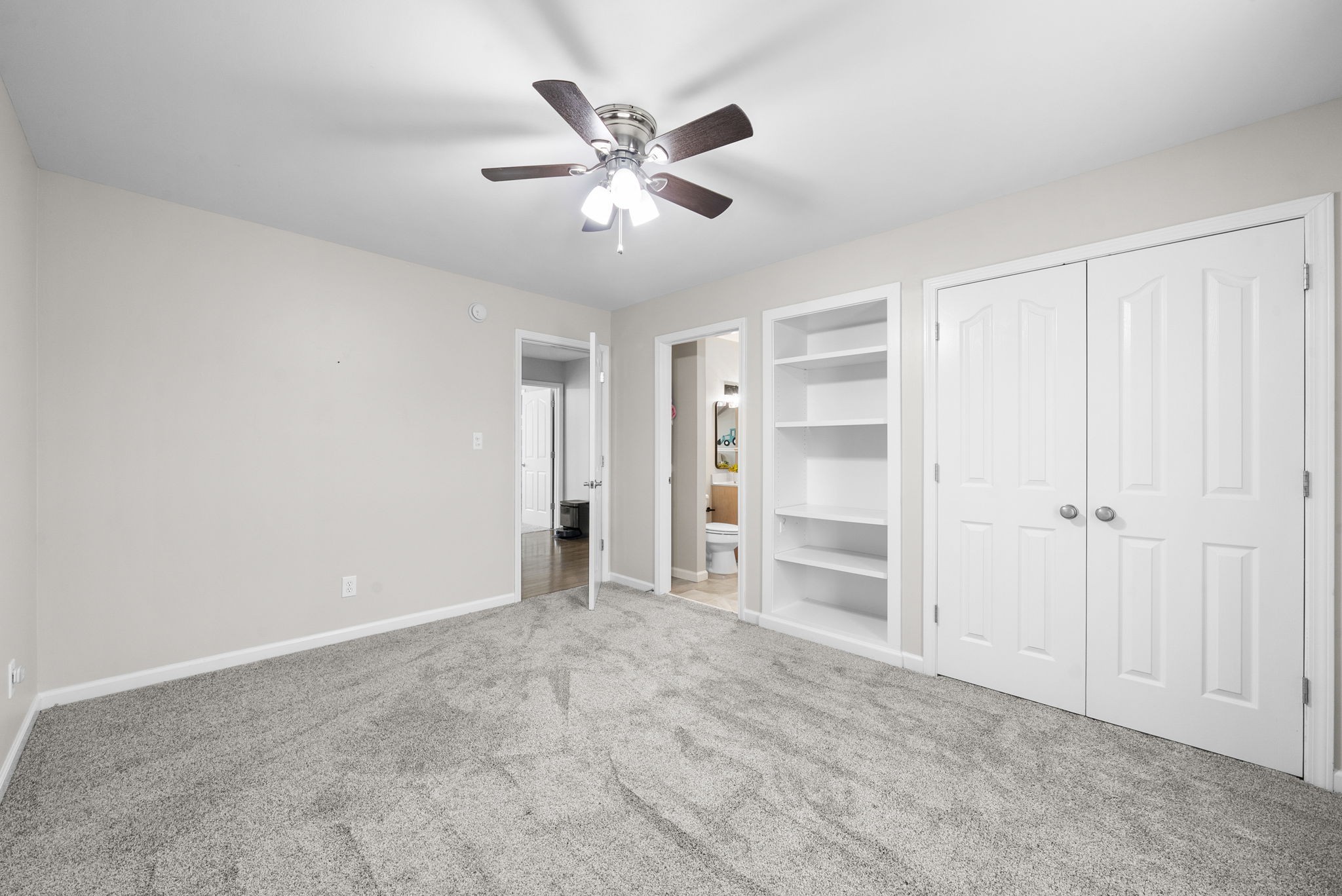 3021 7 Mile Ferry Road Clarksville, TN 37040 - Photo 50 of 99 a view of an empty room with a ceiling fan