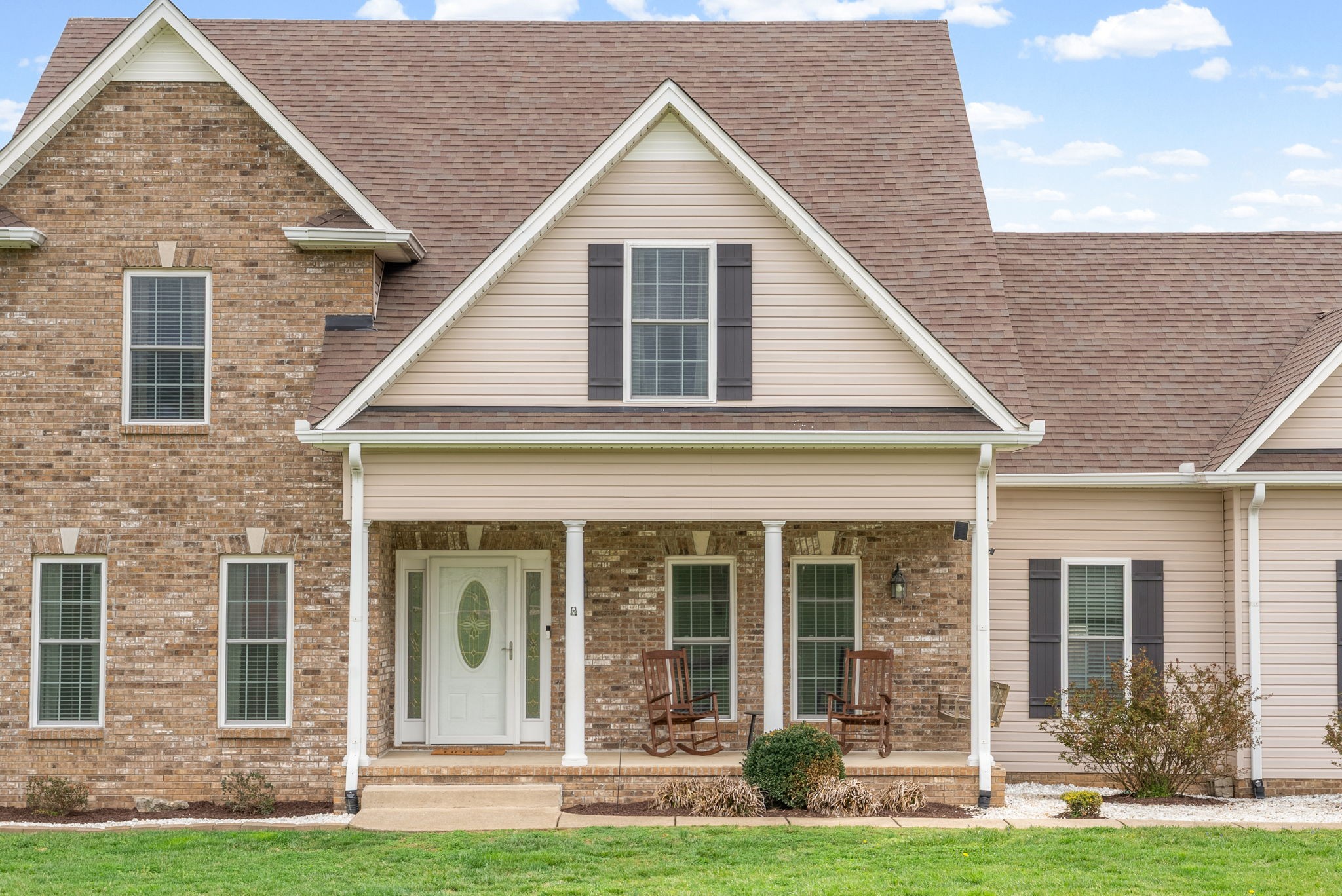 3021 7 Mile Ferry Road Clarksville, TN 37040 - Photo 5 of 99 a front view of a house with a yard
