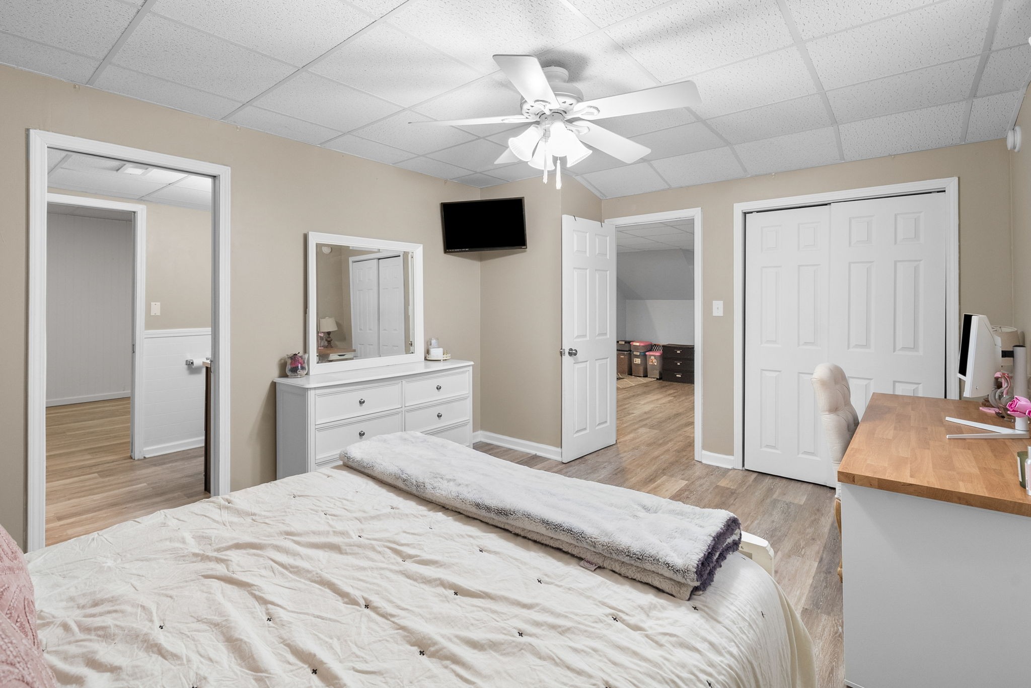 3021 7 Mile Ferry Road Clarksville, TN 37040 - Photo 64 of 99 a bedroom with a bed and a flat screen tv