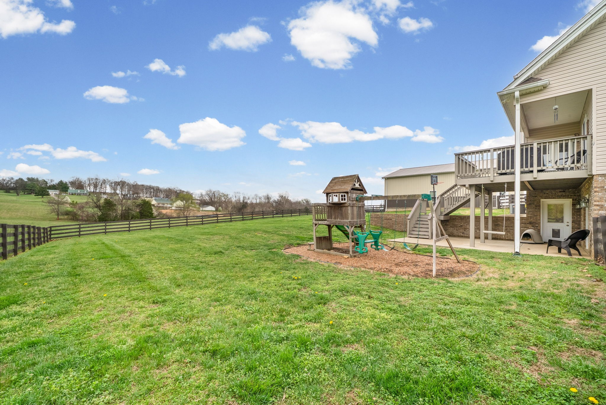 3021 7 Mile Ferry Road Clarksville, TN 37040 - Photo 80 of 99 a view of a house with a backyard porch and sitting area