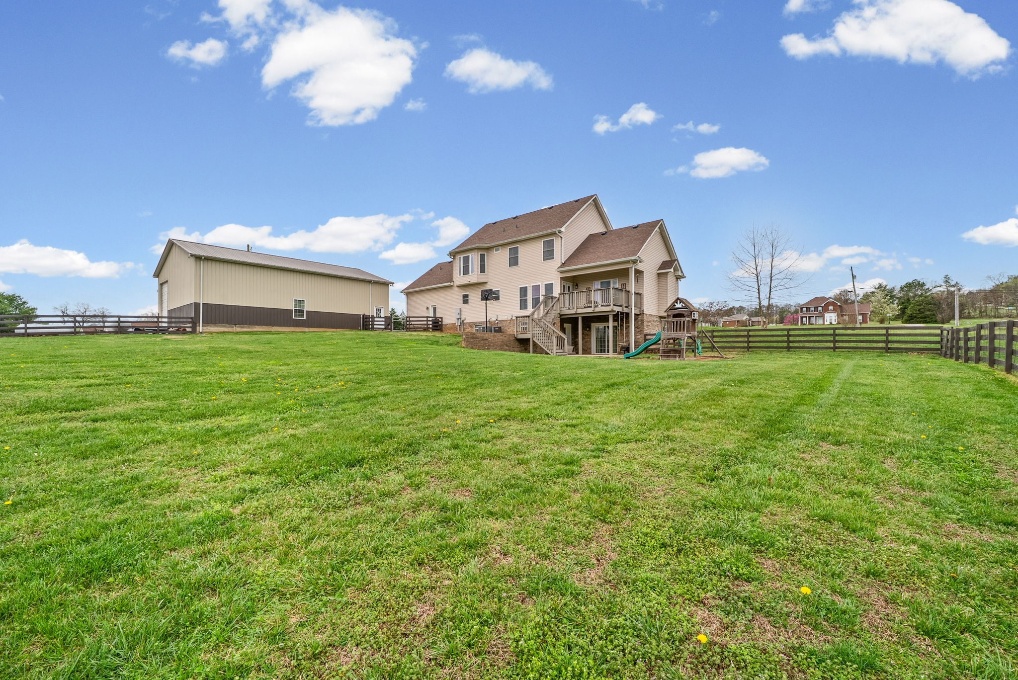 3021 7 Mile Ferry Road Clarksville, TN 37040 - Photo 81 of 99 a view of a house with a big yard and large trees