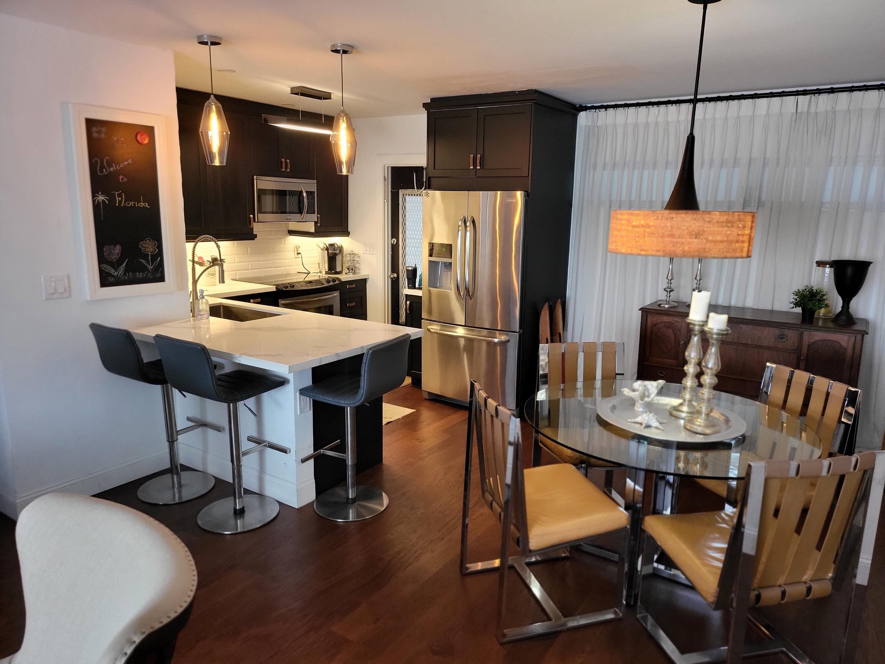 651 Pine Drive, Unit 206 Pompano Beach, FL 33060 - Photo 5 of 31 Eat in Bar Area