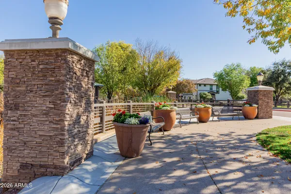a view of a backyard with sitting area