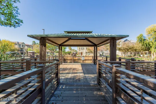 a view of a patio with wooden floor