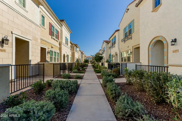 a view of a pathway with a house
