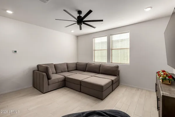 a living room with furniture and a window