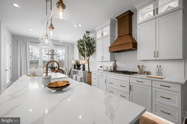 a kitchen with sink cabinets and window