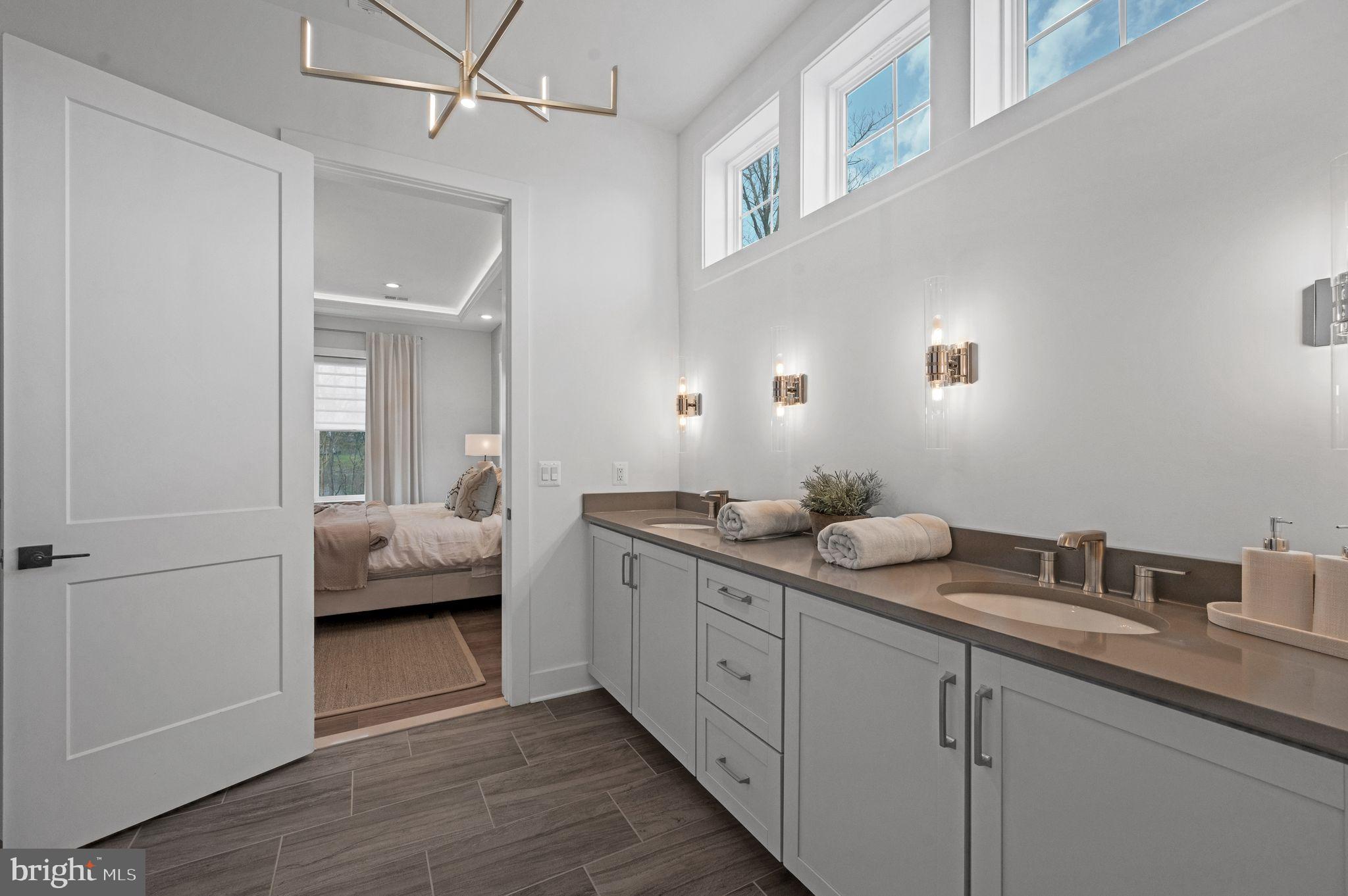 Tbd New Vista Way, Unit 5 Gettysburg, PA 17325 - Photo 26 of 45 a en suite bathroom with a granite countertop double vanity sink a mirror and shower