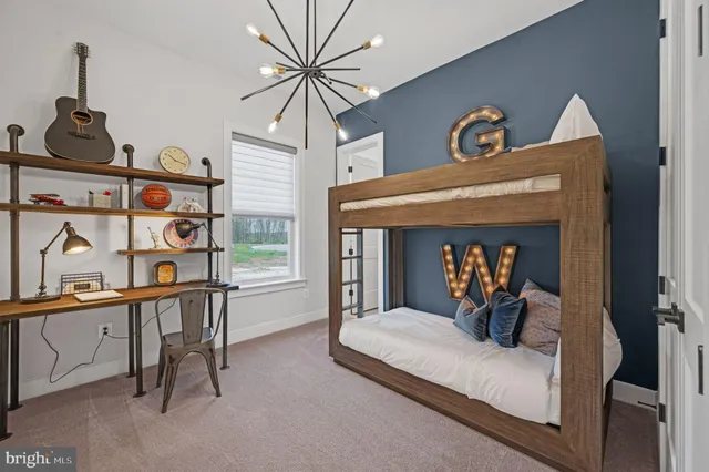 a view of a livingroom with furniture and staircase