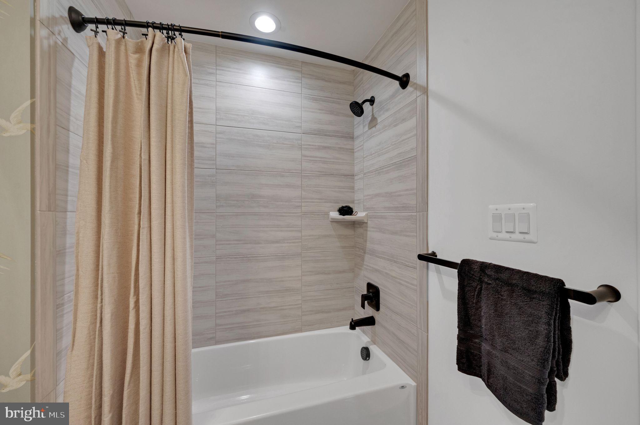 Tbd New Vista Way, Unit 5 Gettysburg, PA 17325 - Photo 35 of 45 a bathroom with a shower and a tub