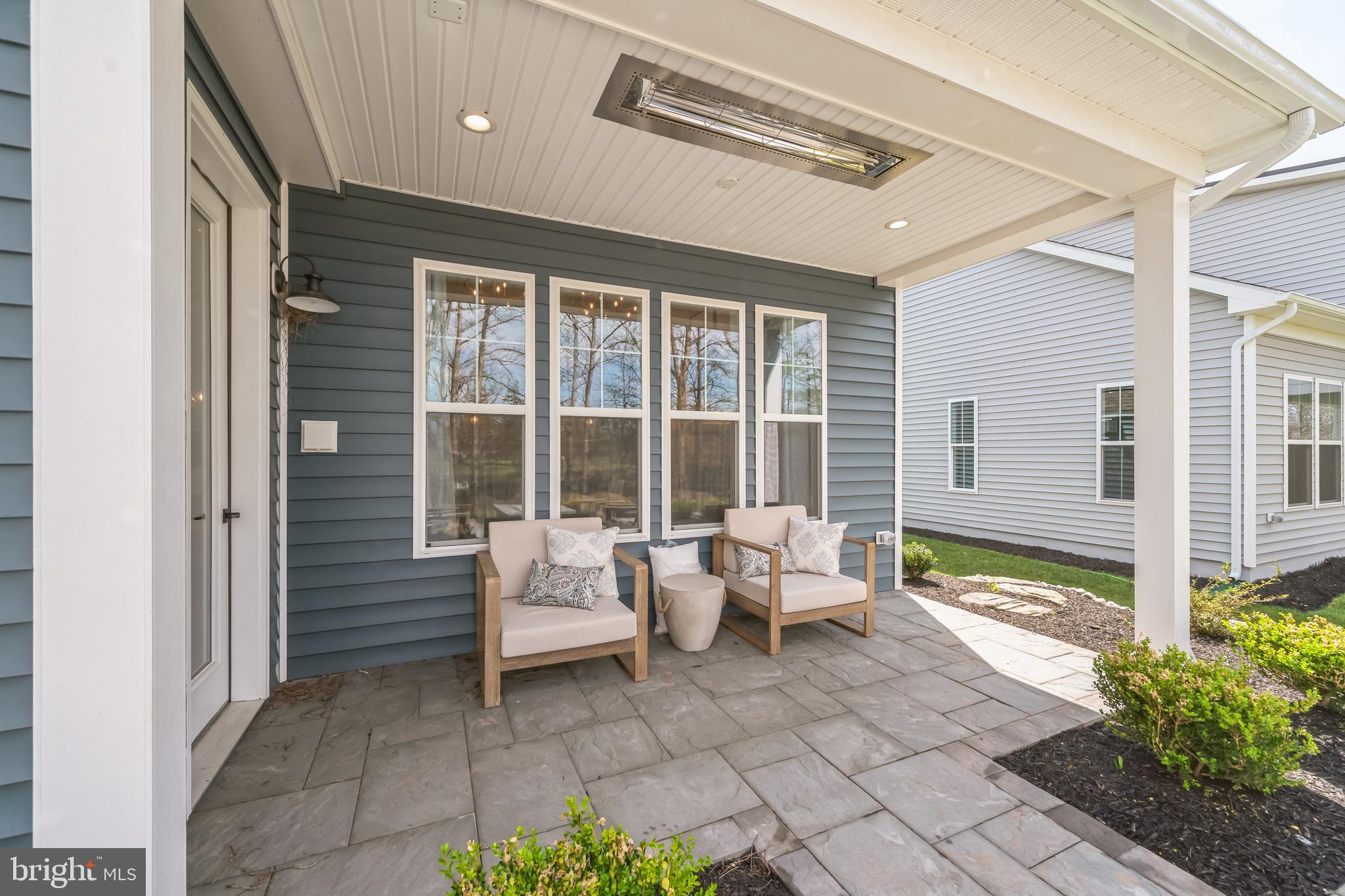 Tbd New Vista Way, Unit 5 Gettysburg, PA 17325 - Photo 40 of 45 a balcony with chairs and with potted plants