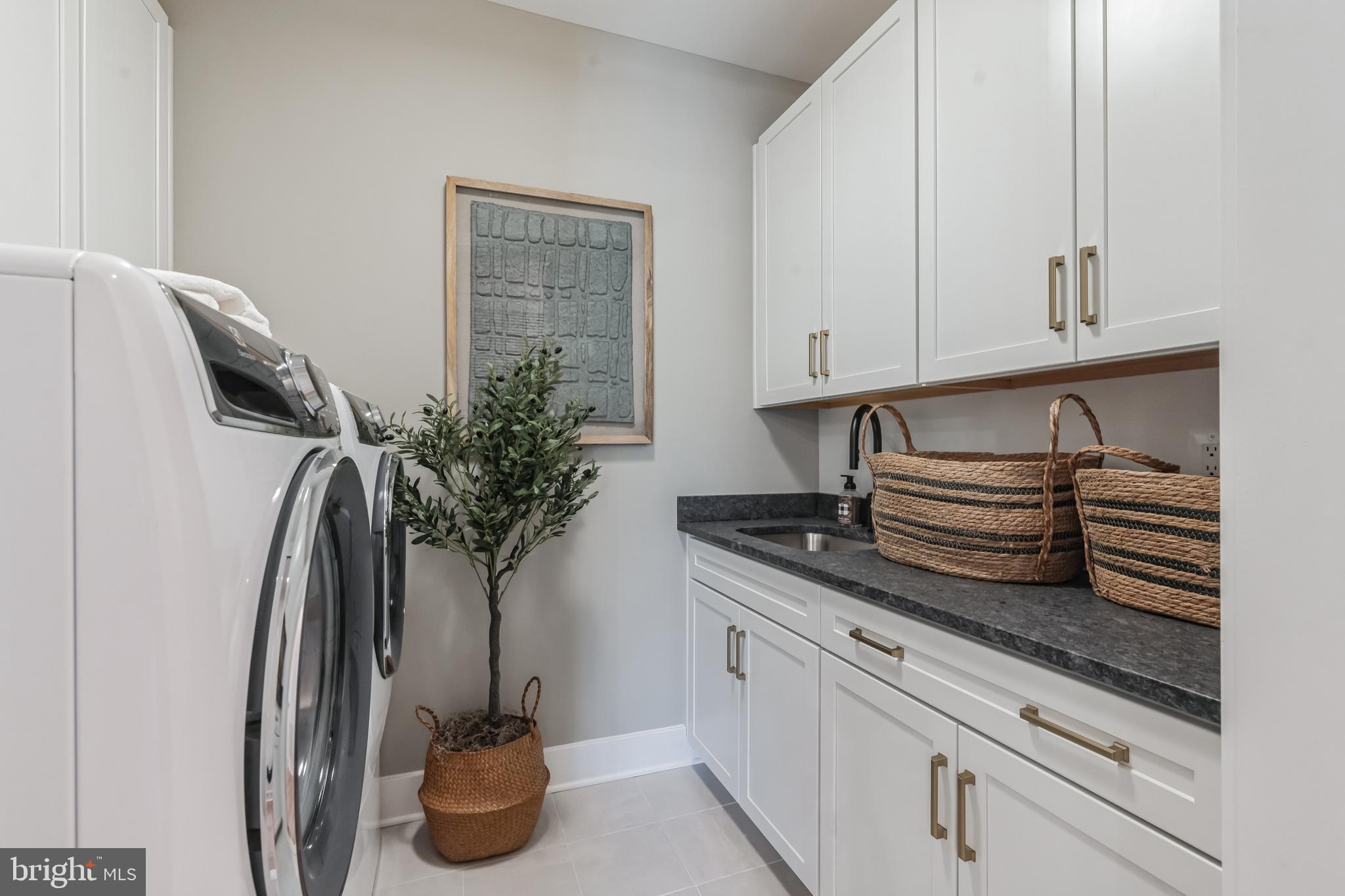 Tbd New Vista Way, Unit 5 Gettysburg, PA 17325 - Photo 41 of 45 a kitchen with stainless steel appliances granite countertop a sink a stove and white cabinets