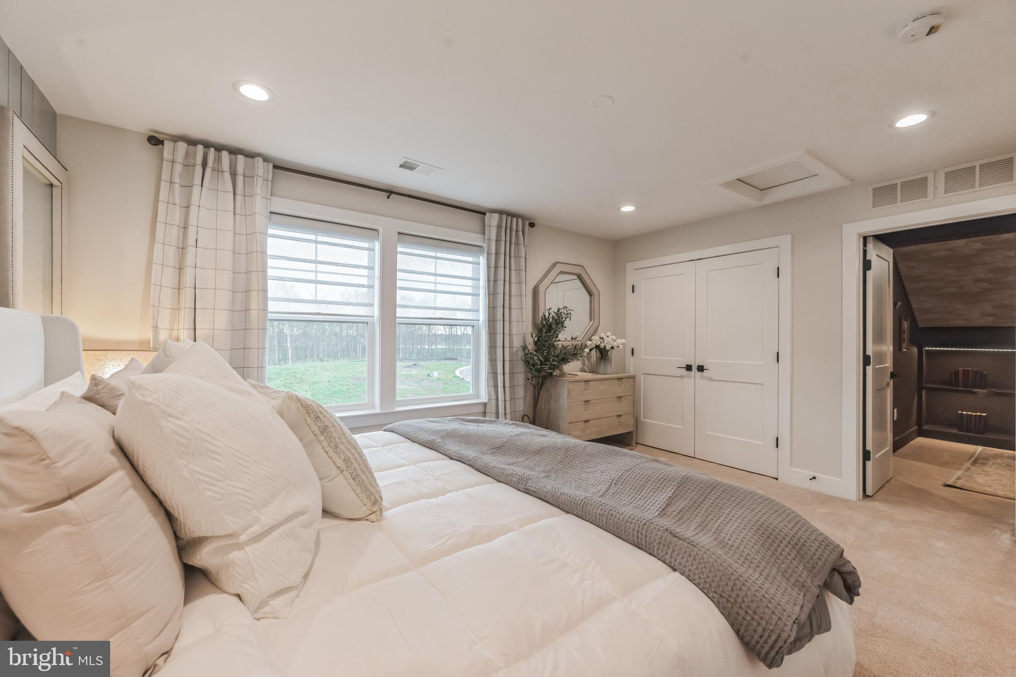 Tbd New Vista Way, Unit 5 Gettysburg, PA 17325 - Photo 45 of 45 a spacious bedroom with a large bed and a large window