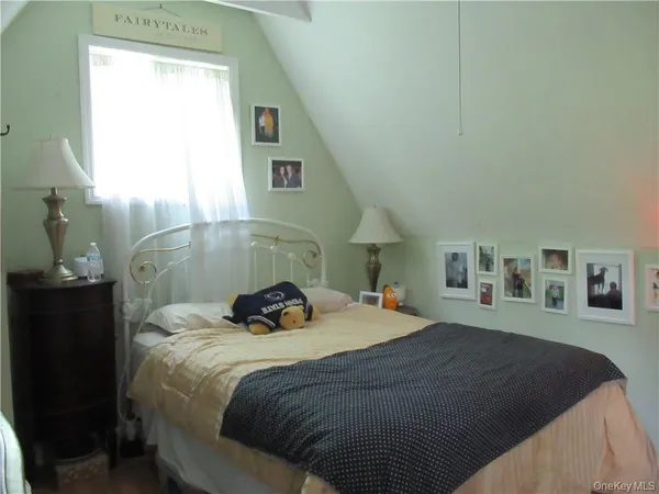 a view of a hallway with entryway