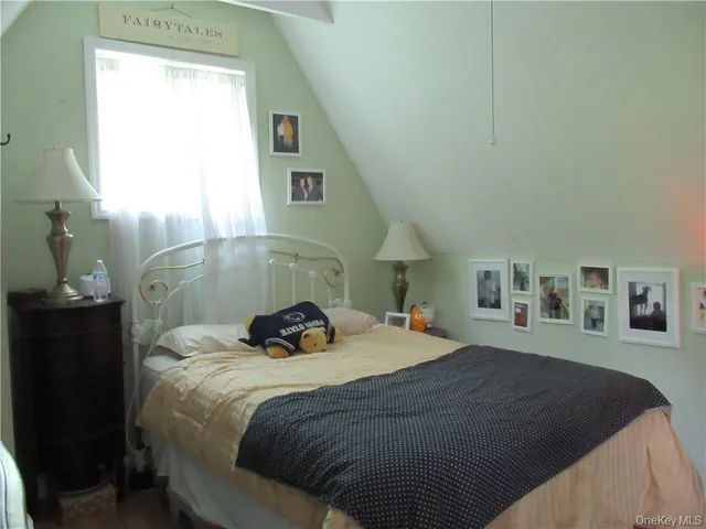 a view of a hallway with entryway